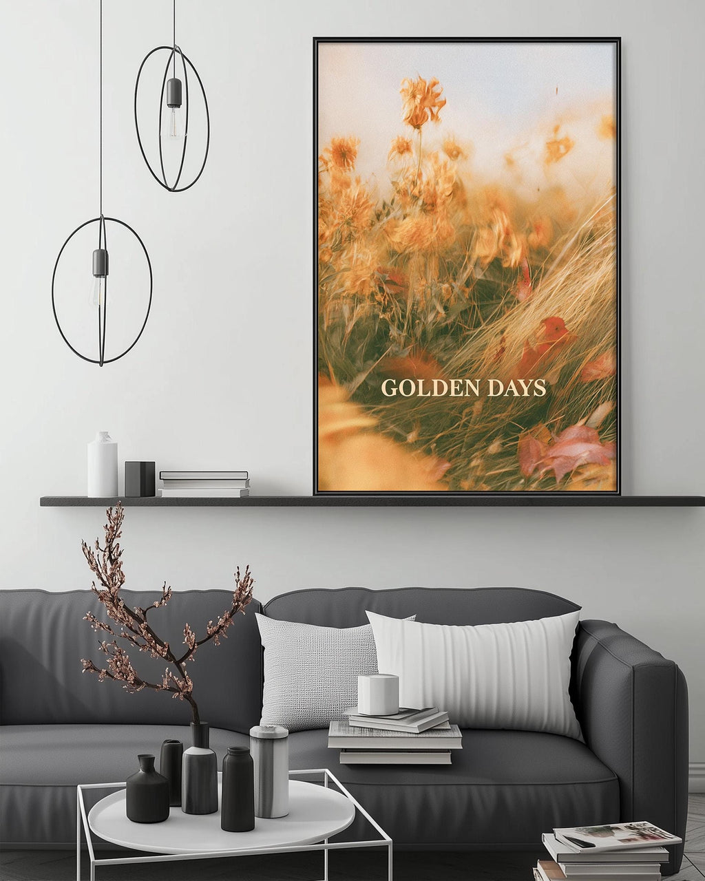a modern living room with a gray sofa, a coffee table, and a large framed print of a field of flowers hanging on the wall.