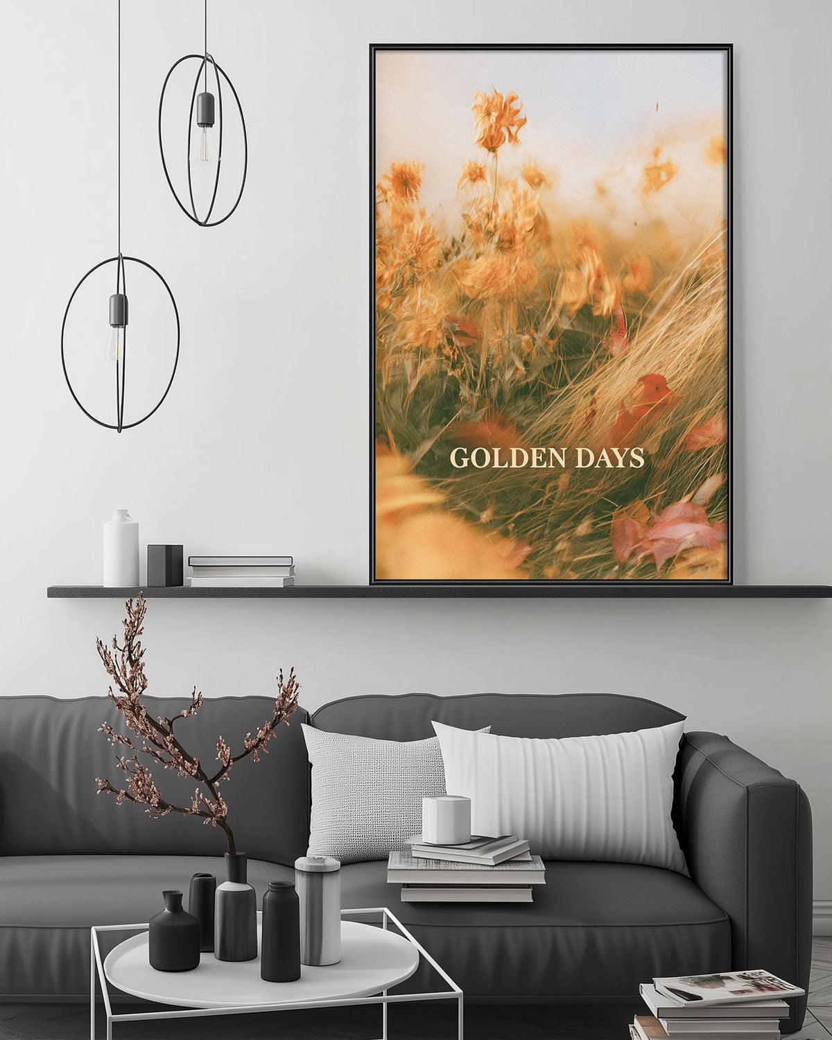 a modern living room with a gray sofa, a coffee table, and a large framed print of a field of flowers hanging on the wall.