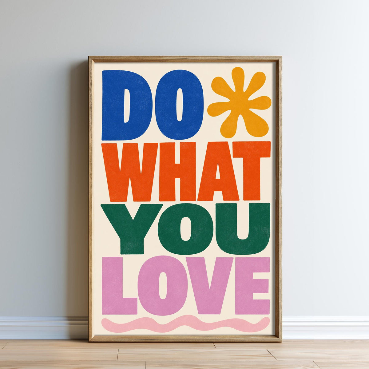 The image is a framed poster with the text "DO WHAT YOU LOVE" in a colorful, stylized font.
