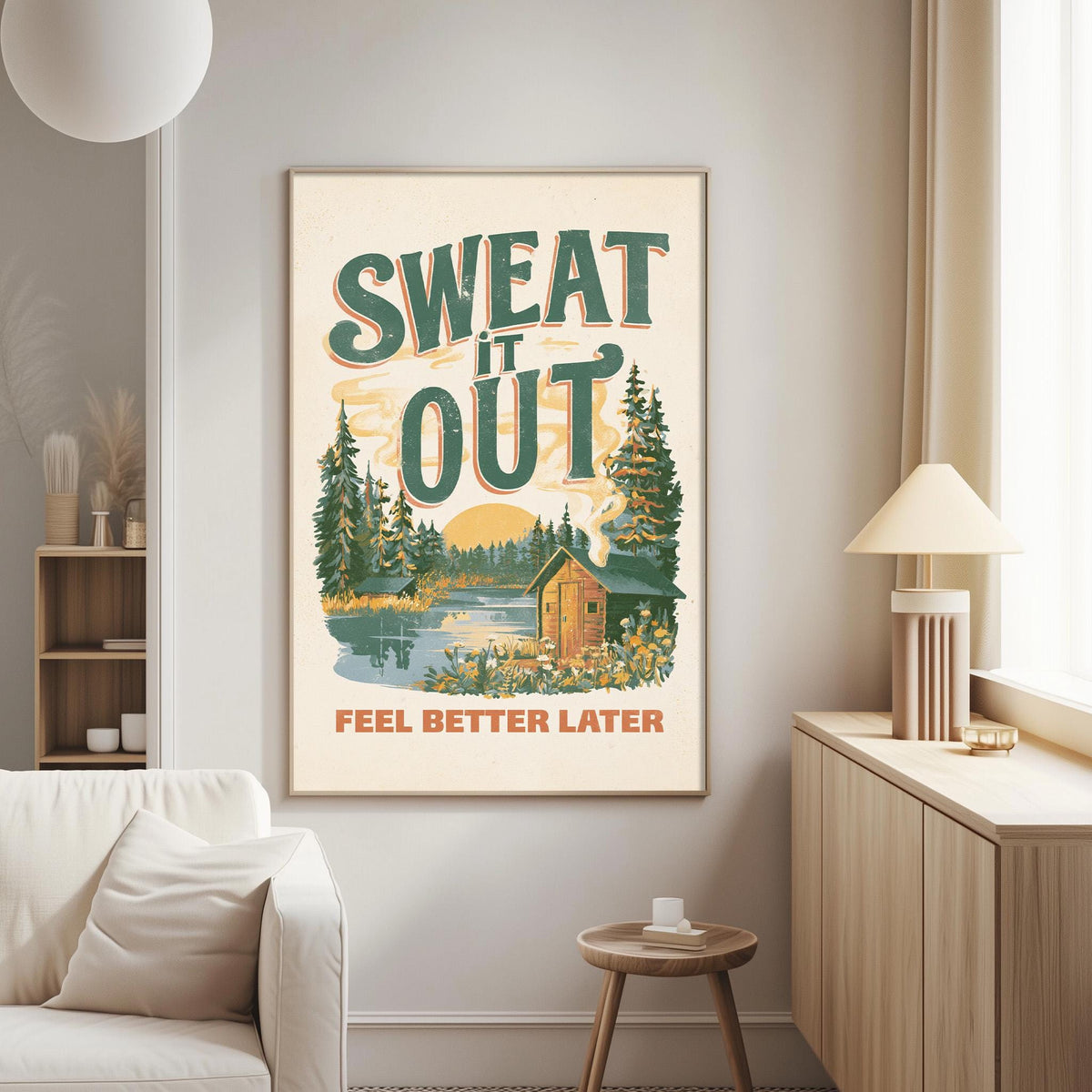 a poster with a forest scene and a cabin, hanging on a wall in a living room.