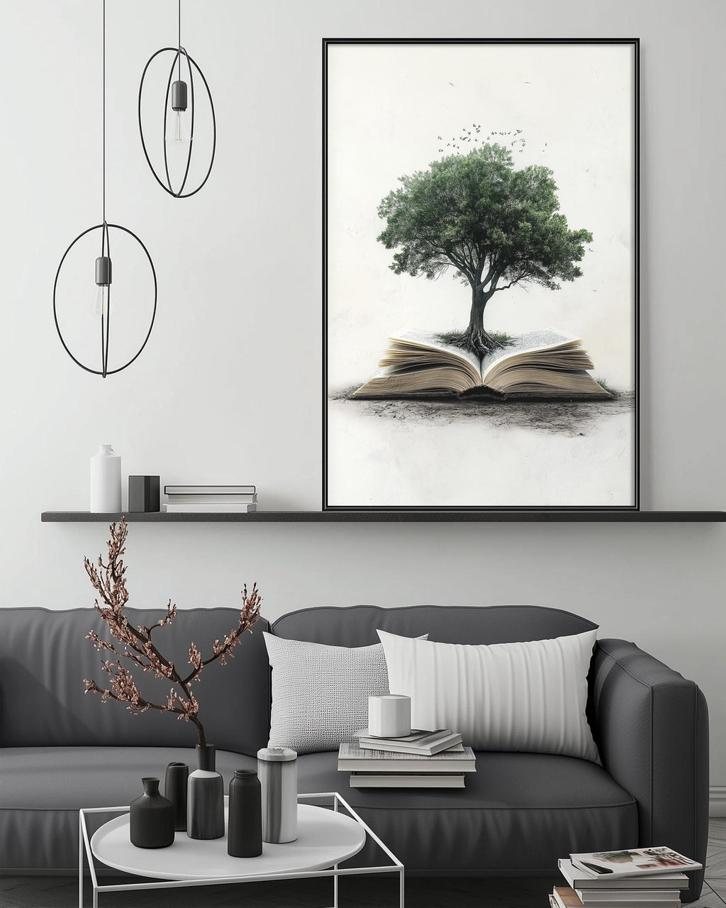 a cozy living room with a gray sofa, a coffee table, and a large framed artwork depicting a tree growing out of an open book.