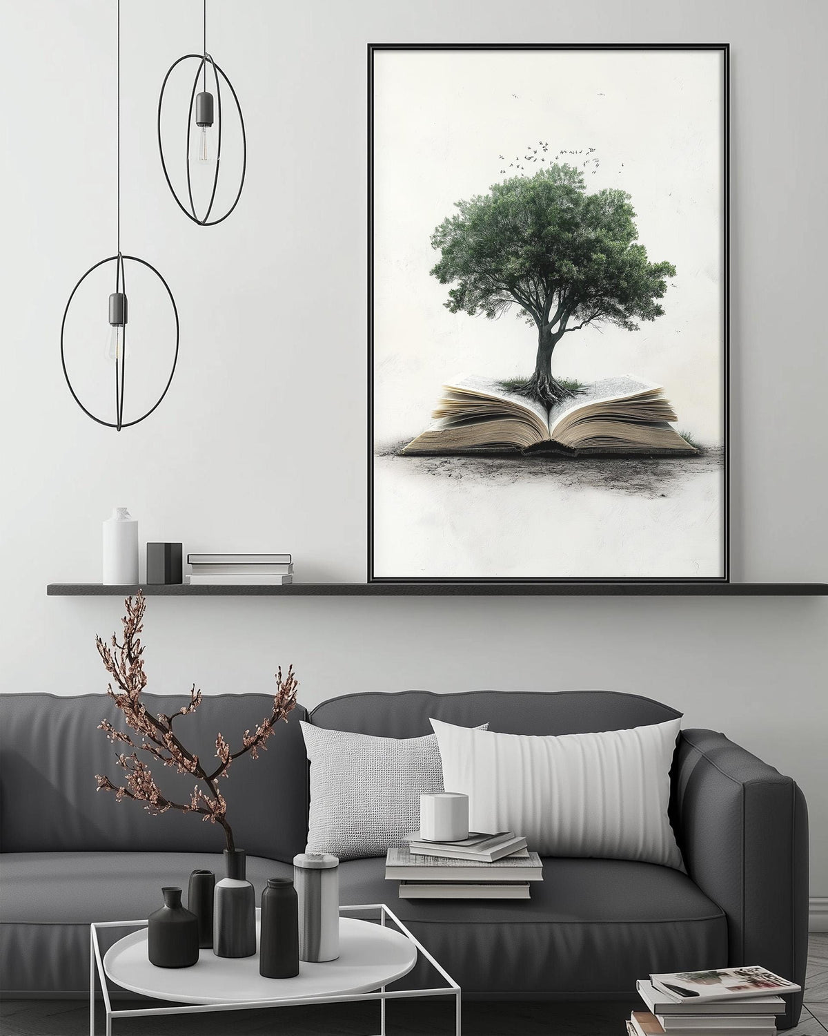 a cozy living room with a gray sofa, a coffee table, and a large framed artwork depicting a tree growing out of an open book.