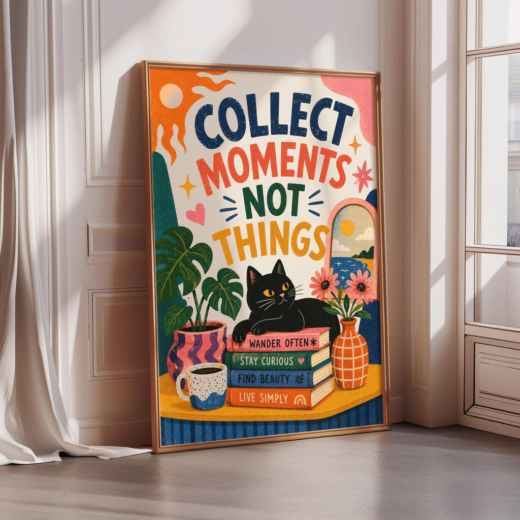 The image is a poster with a colorful and whimsical design, featuring a cat, flowers, and various decorative elements. The text on the poster reads "Collect moments, not things", and it encourages the viewer to "Wander often, stay curious, find beauty, live simply".