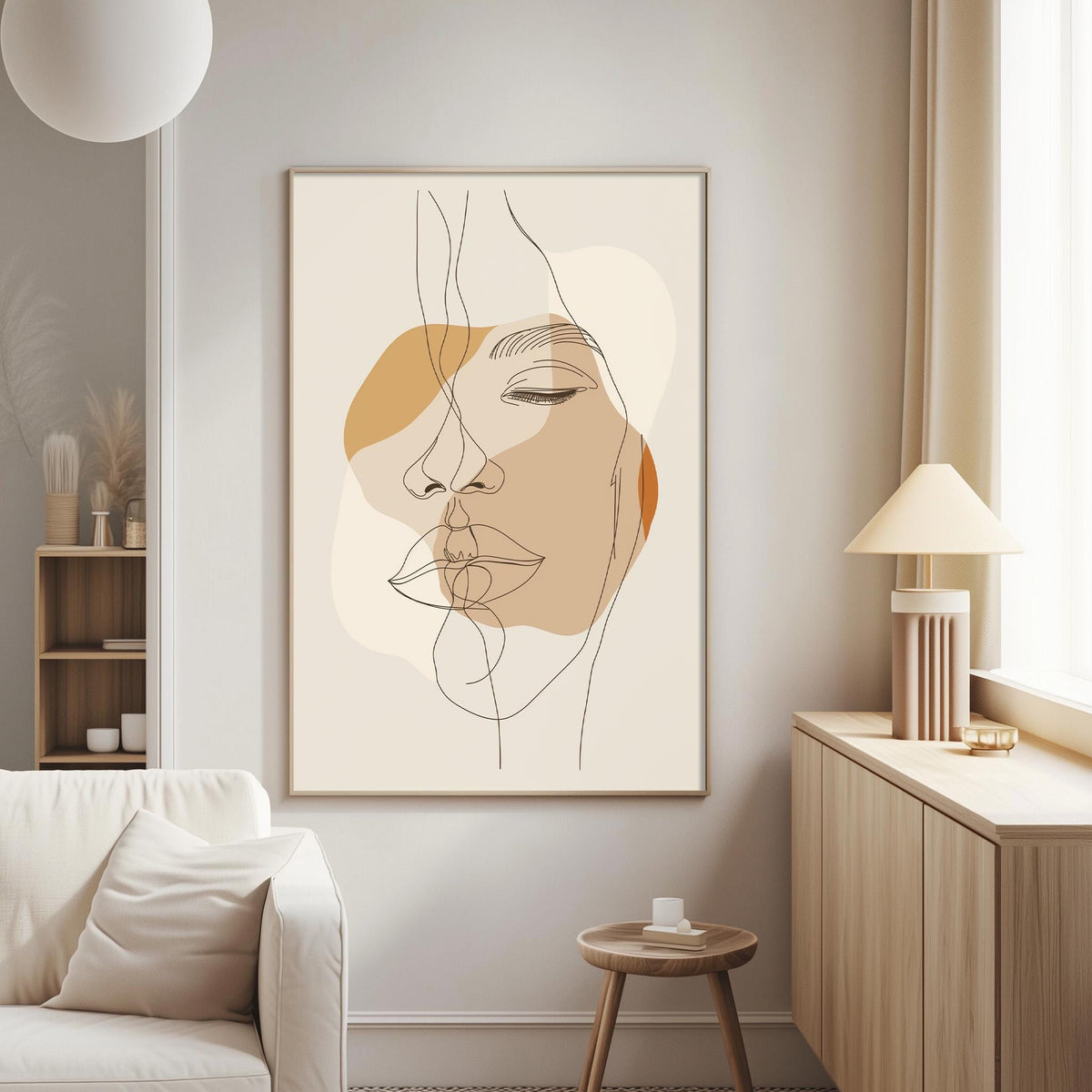 a living room with a large abstract portrait of a woman's face hanging on the wall. The room has a white sofa, a wooden side table, and a lamp on a nearby table.