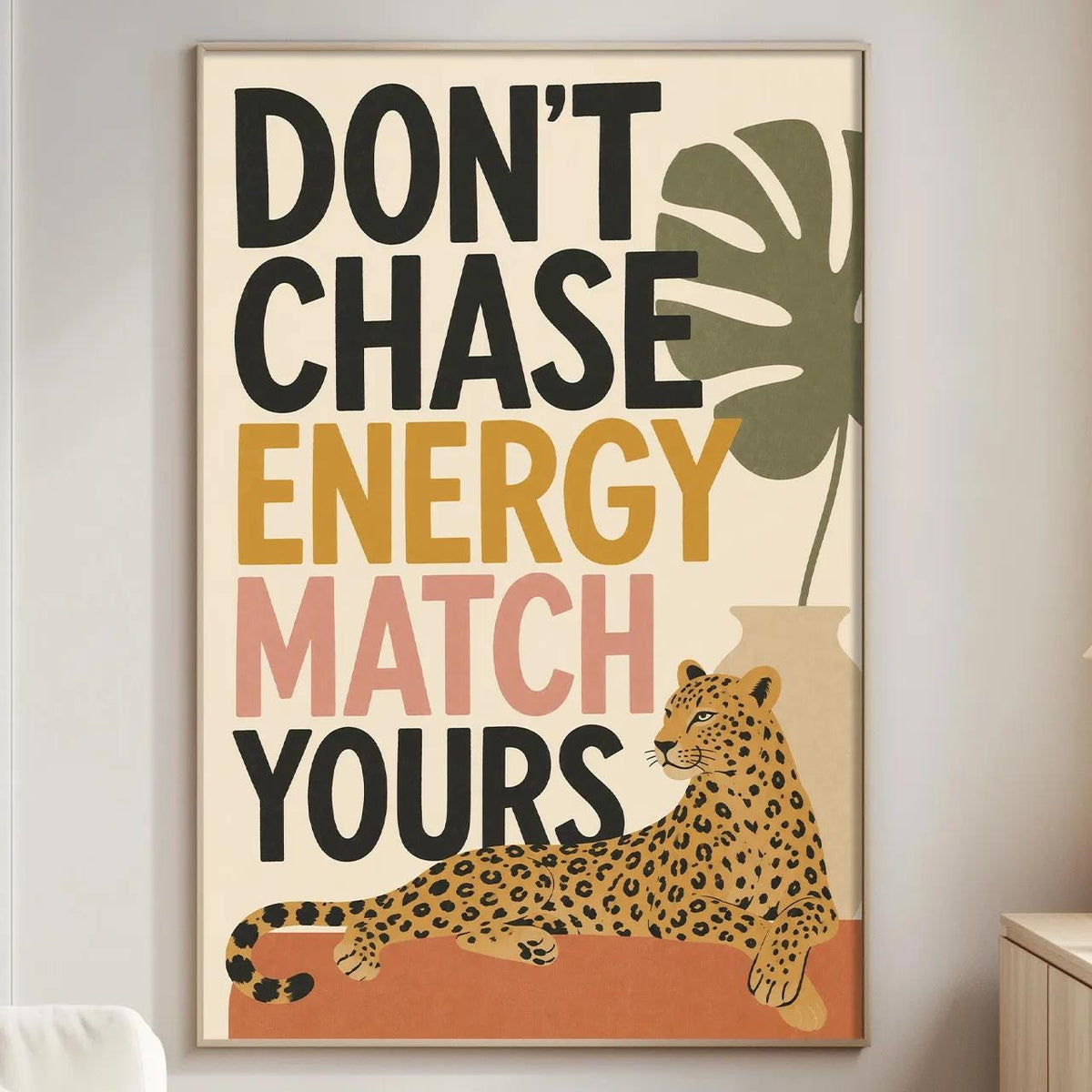 a poster with the text "DON'T CHASE ENERGY MATCH YOURS" and an illustration of a leopard.