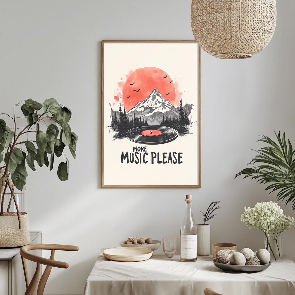 a framed poster with a mountain landscape and a record player, along with the text "MORE MUSIC PLEASE" displayed on the poster. The poster is hanging on a wall, and there is a dining table with various items on it, including a bottle, a bowl, and a vase.