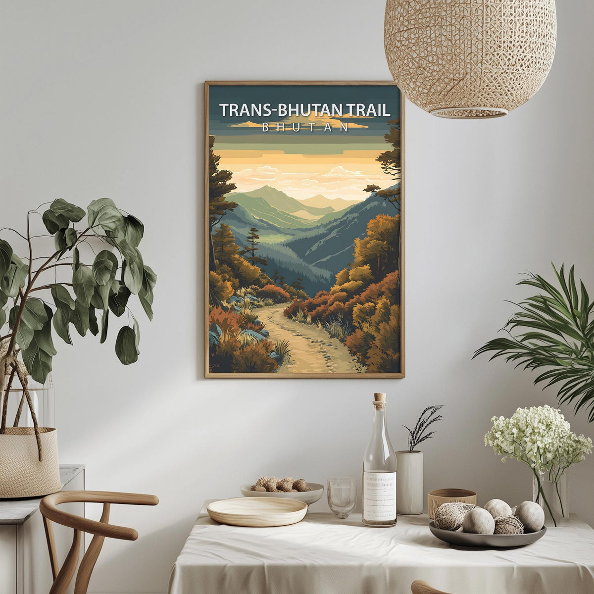 a framed poster of a scenic mountain landscape hanging on a wall, with a dining table and chairs in the foreground.