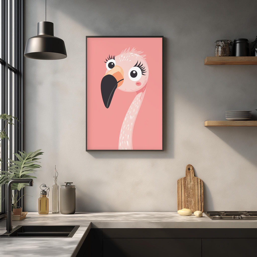 a kitchen counter with a framed picture of a pink flamingo hanging on the wall above it. The kitchen counter also has various items such as a cutting board, a bottle, and a plant.