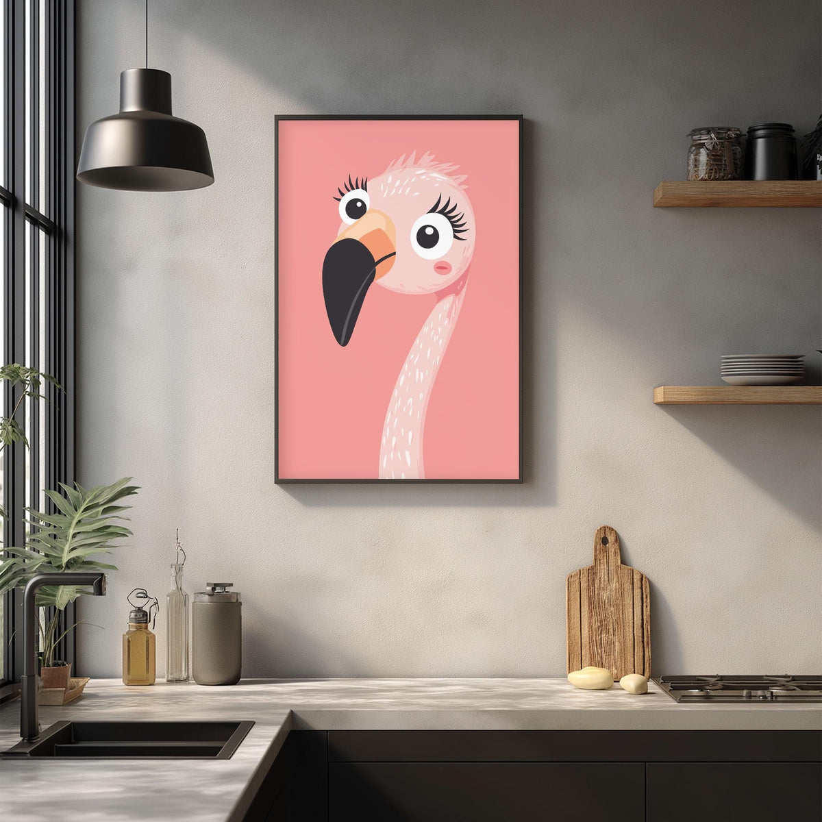 a kitchen counter with a framed picture of a pink flamingo hanging on the wall above it. The kitchen counter also has various items such as a cutting board, a bottle, and a plant.