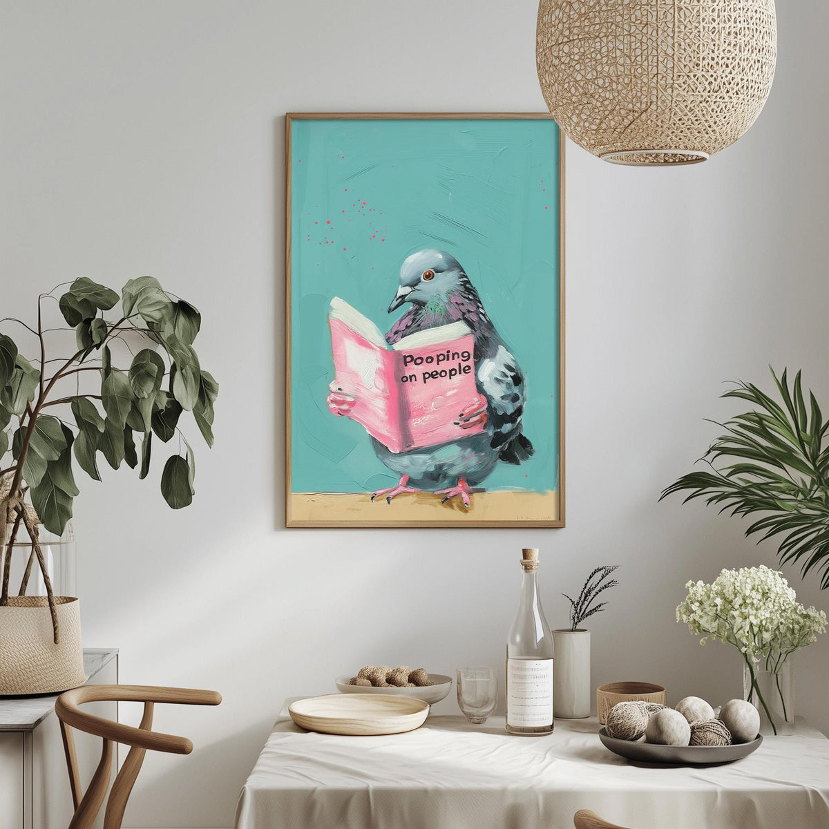 a framed painting of a pigeon holding a book titled "Poopping on people" and sitting on a table with various items such as a bottle, a bowl, and a vase.