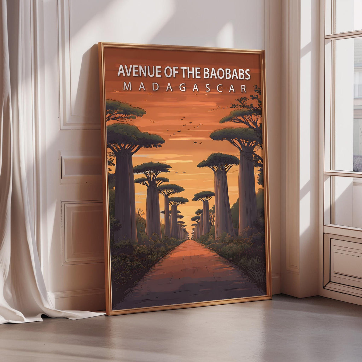 A framed poster depicting a tropical landscape with a winding path leading through a forest of tall trees, set against an orange and yellow sunset sky.