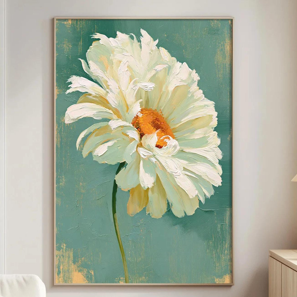 a large, vibrant painting of a white flower with an orange center, hanging on a wall in a living room setting.