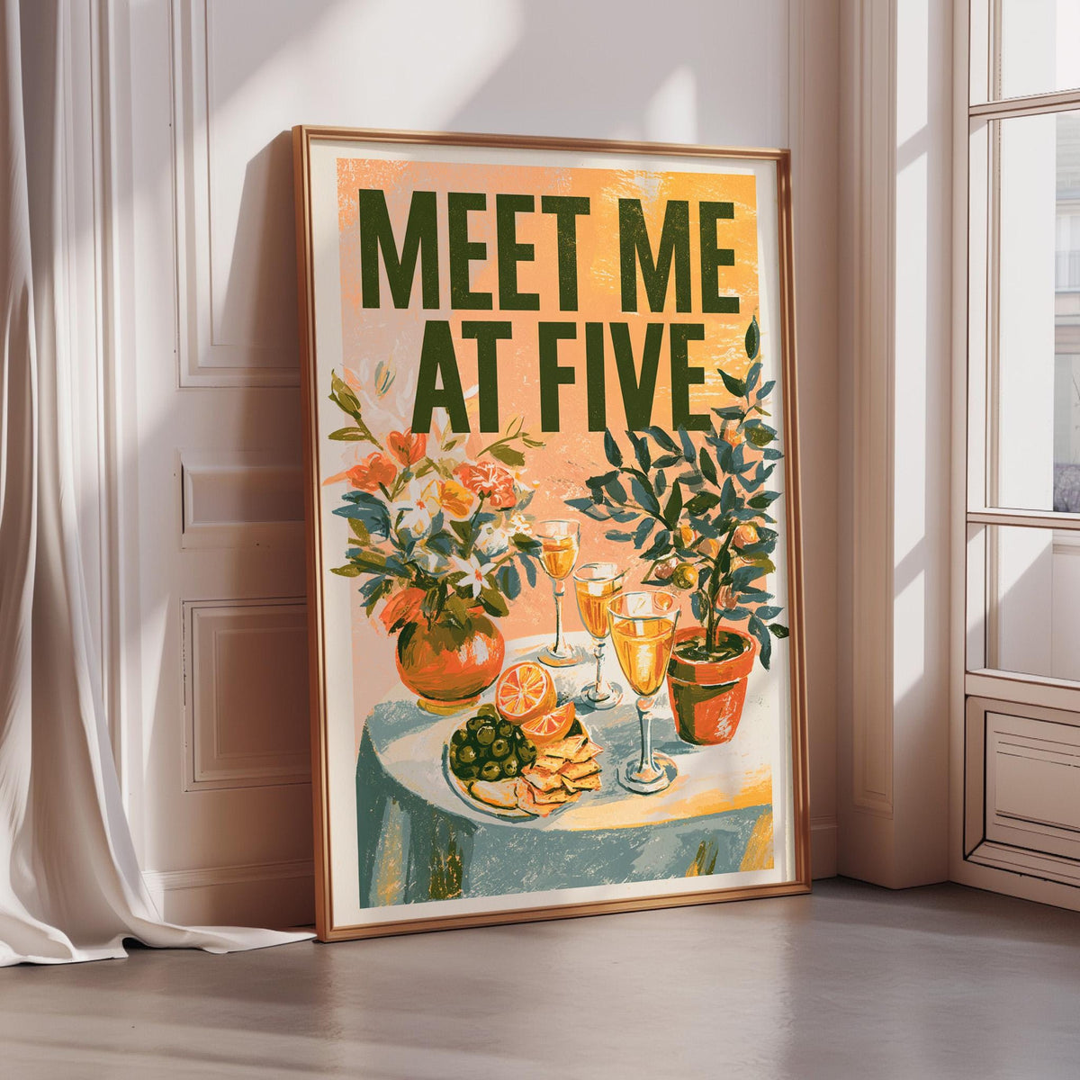 The image is a framed poster with a colorful illustration of a table with various items, including flowers, wine glasses, and fruit. The text on the poster reads "MEET ME AT FIVE".