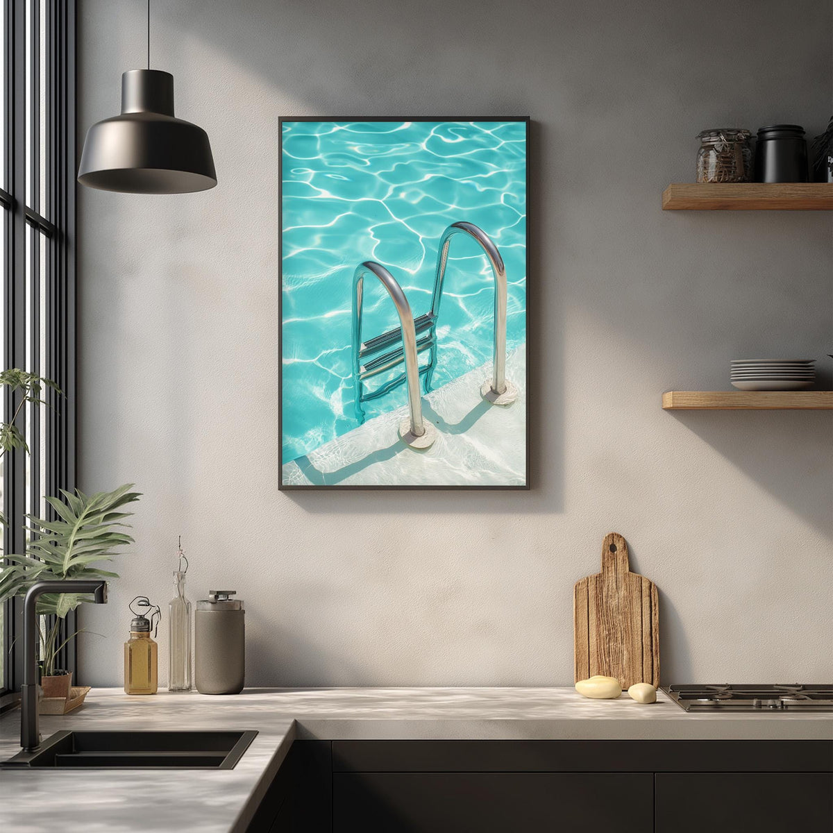 a framed photograph of a swimming pool with a ladder, hanging on a wall above a kitchen counter with various kitchen items and decor.