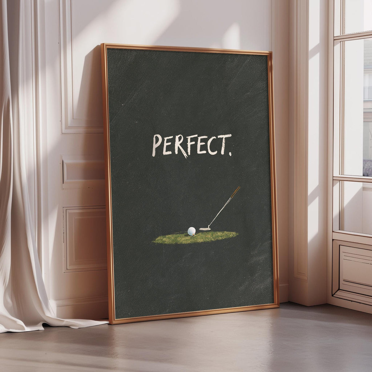 A framed poster with the word "PERFECT" written on it, along with an illustration of a golf club and ball on a green surface.