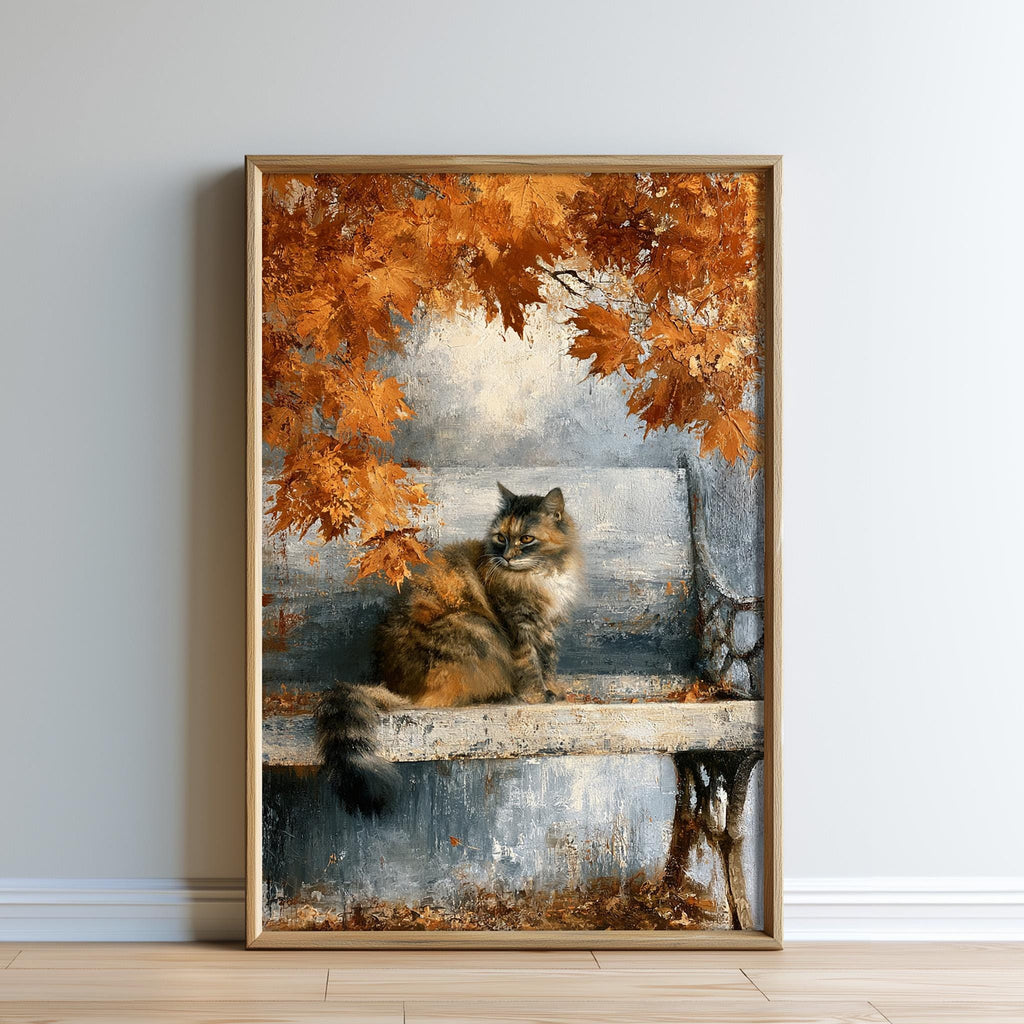 A framed painting depicting a cat sitting on a bench, surrounded by autumn leaves.