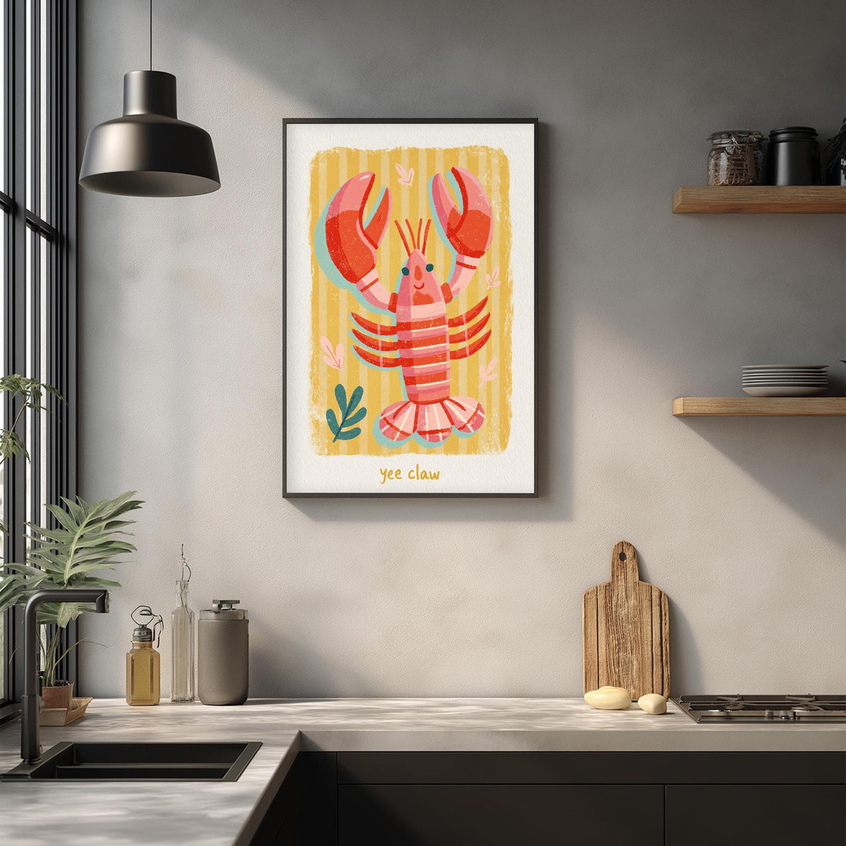 a framed illustration of a lobster on a wall, with a kitchen counter and various kitchen items in the foreground.