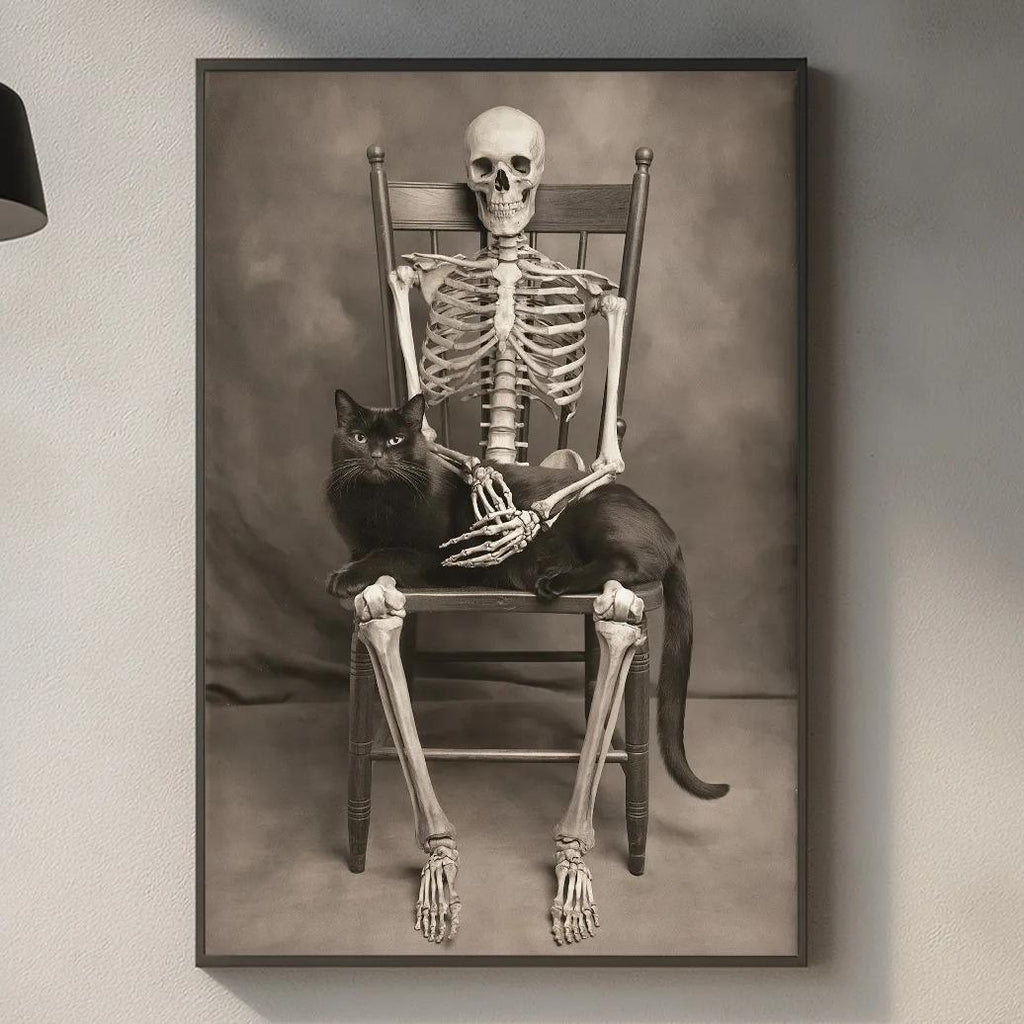 a skeleton sitting in a chair with a cat on its lap, displayed on a wall in a kitchen setting.
