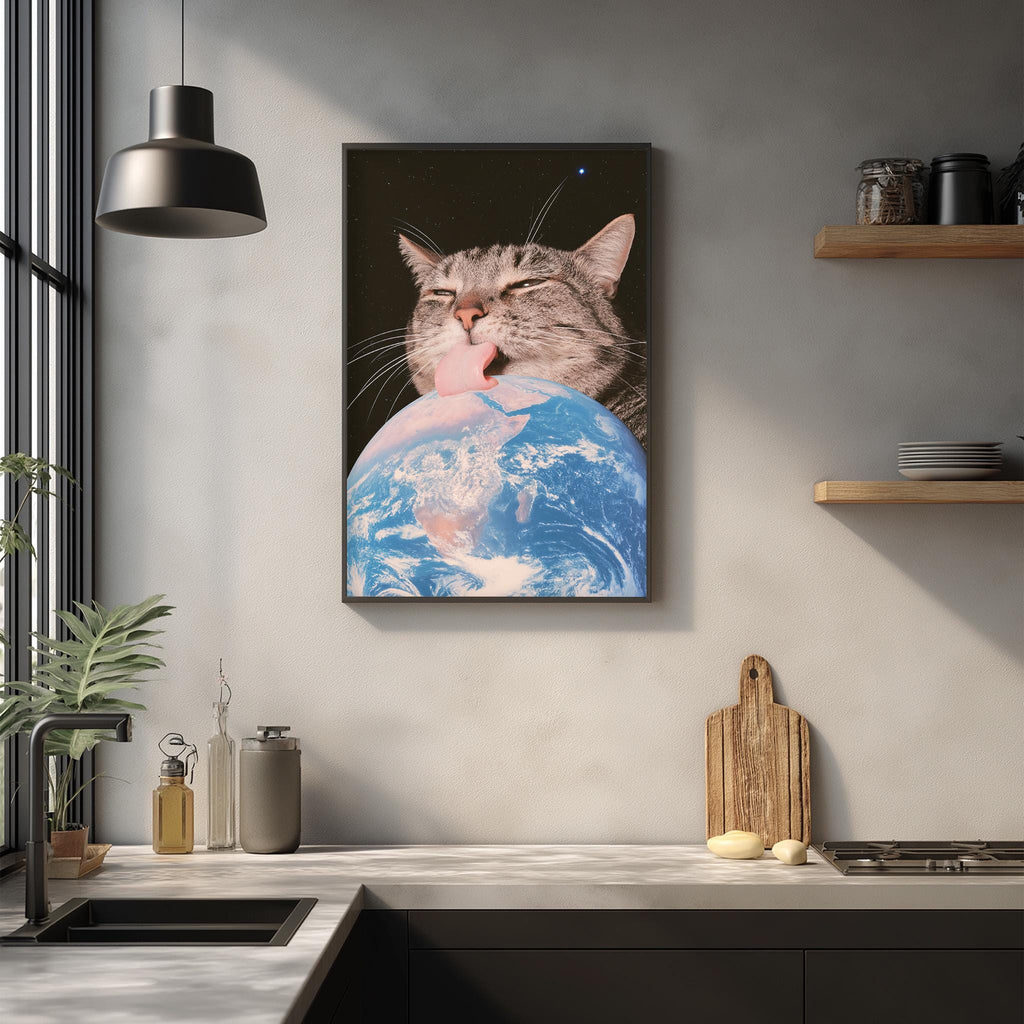 a cat licking a globe, which is a creative and whimsical scene.