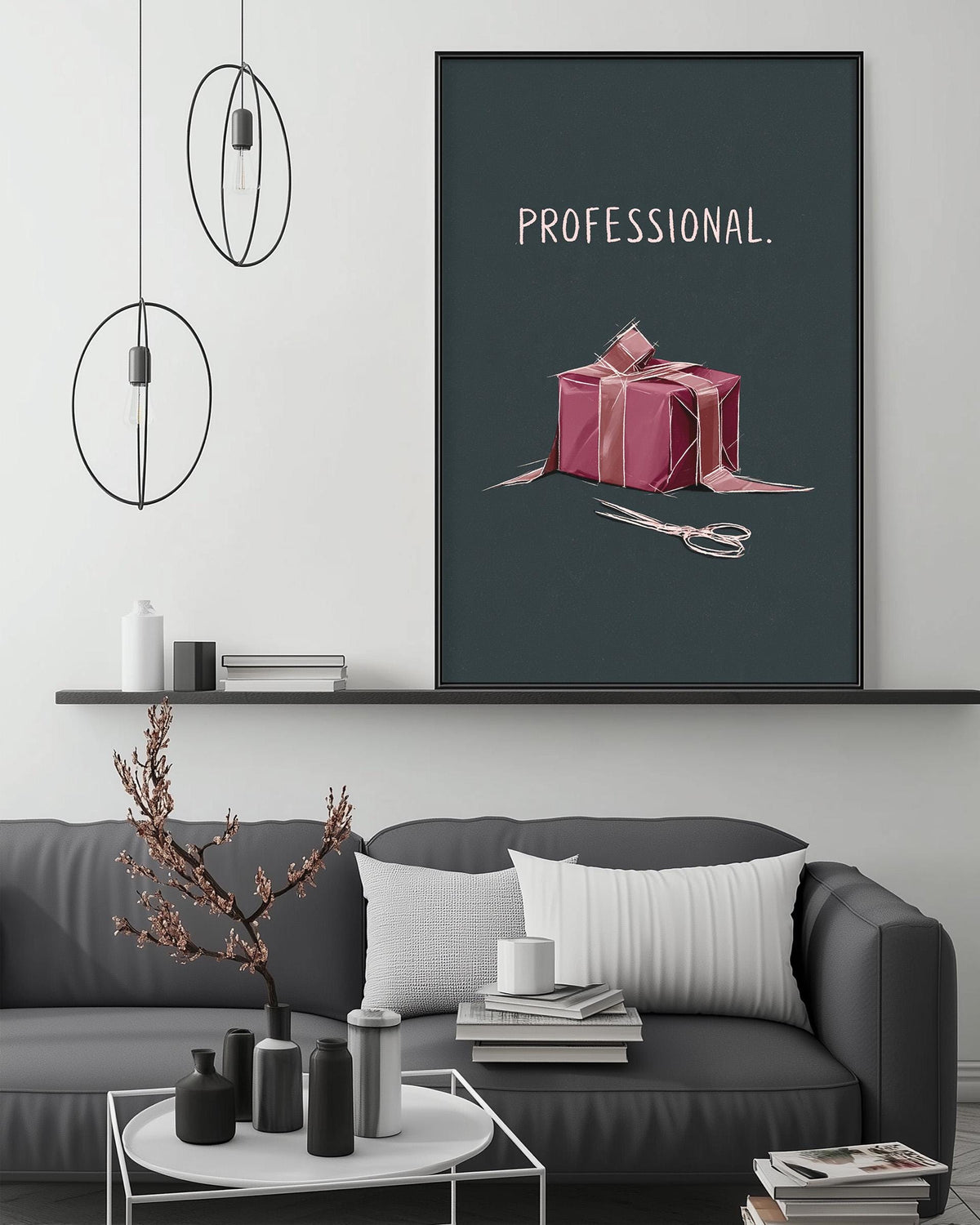 a modern living room with a gray sofa, a coffee table, and a large framed poster with a gift box and scissors on it. The poster has the word "PROFESSIONAL" written on it.