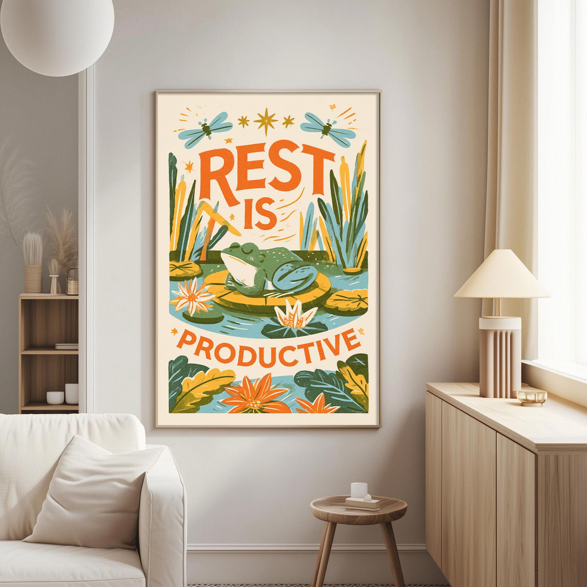 a poster with a frog and flowers hanging on a wall in a living room.