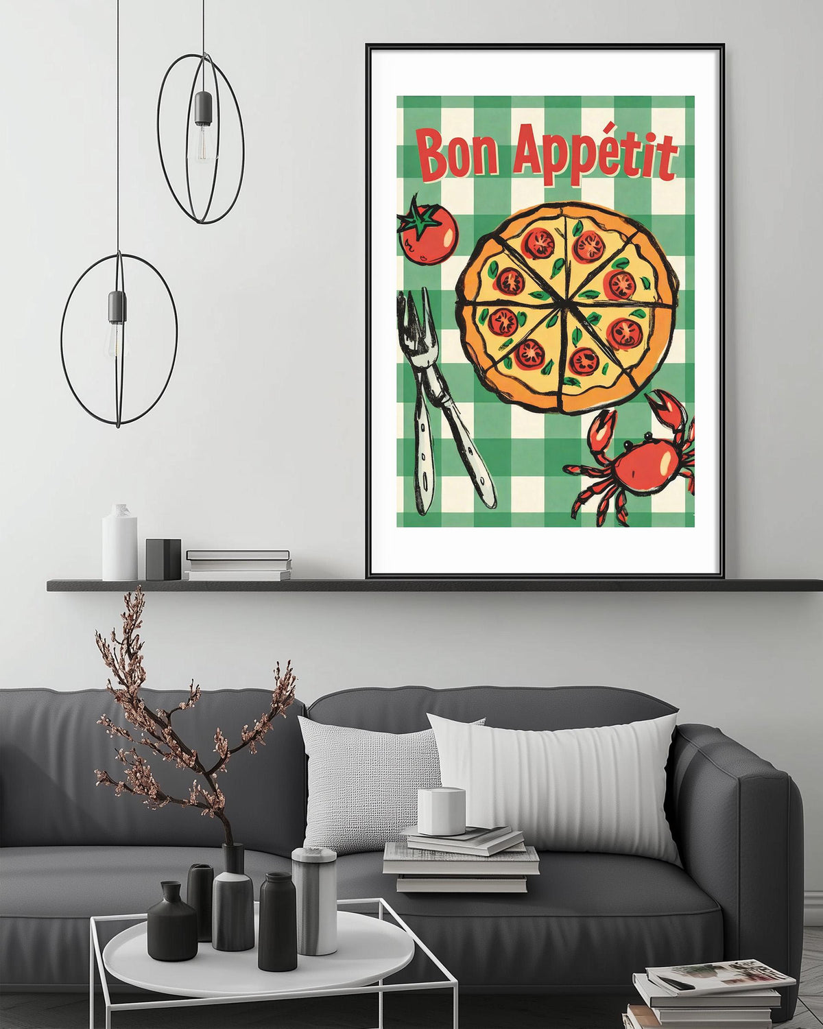 a cozy living room with a gray couch, a coffee table, and a framed poster of a pizza and crab on the wall.