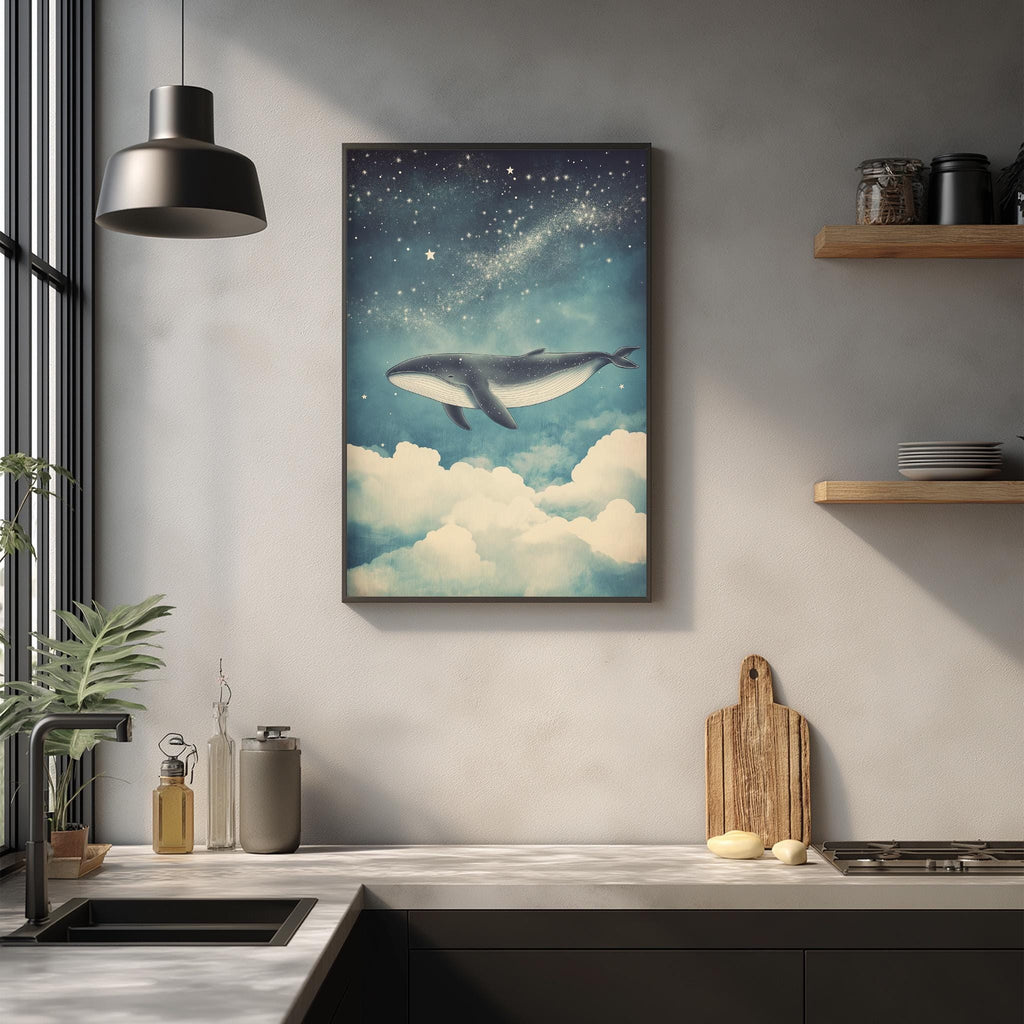 a kitchen counter with a framed painting of a whale swimming in the sky above it, along with various kitchen items such as a cutting board, a soap dispenser, and a plant.
