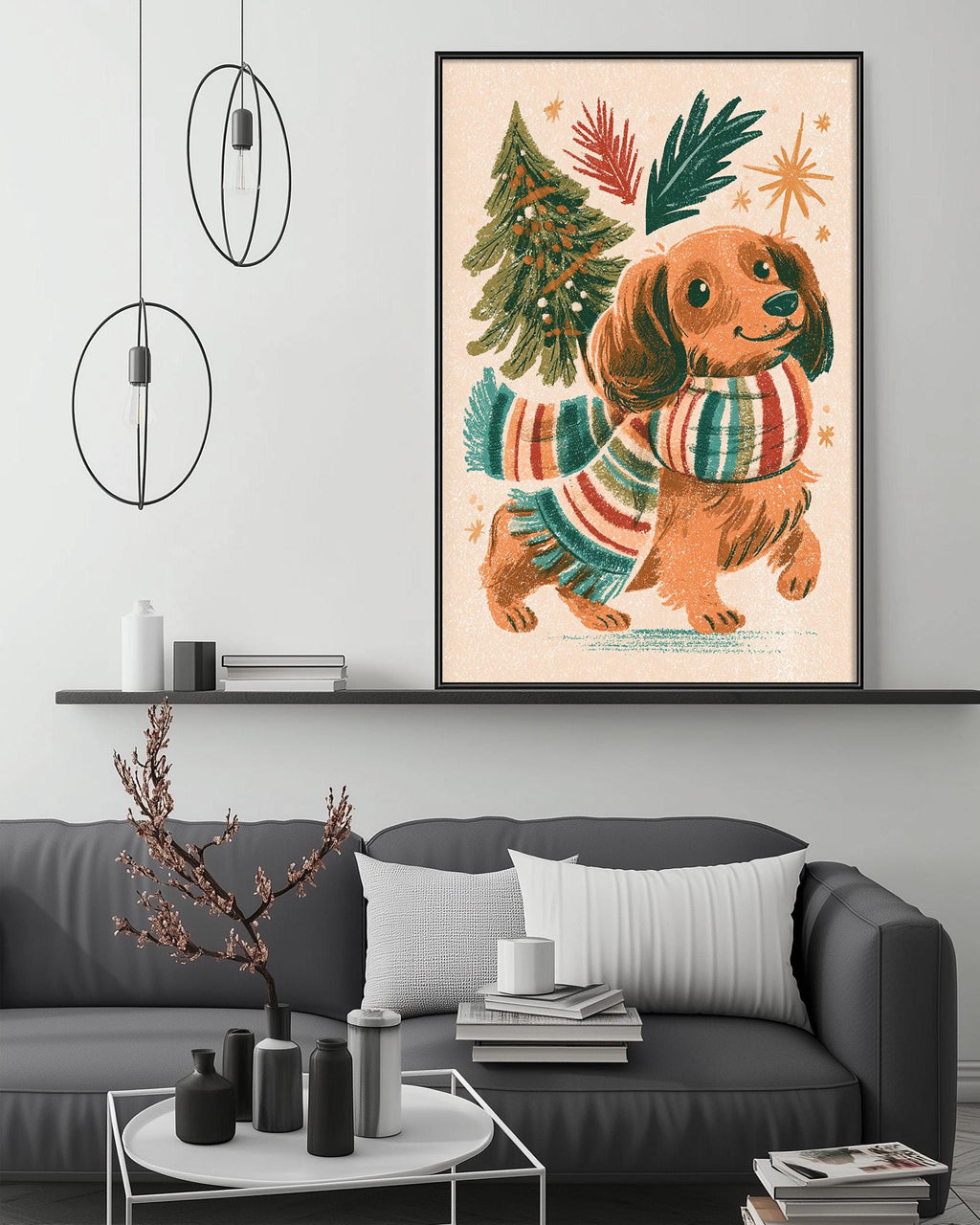 a cozy living room with a gray couch, a coffee table, and a large framed illustration of a dog wearing a scarf and surrounded by festive decorations.