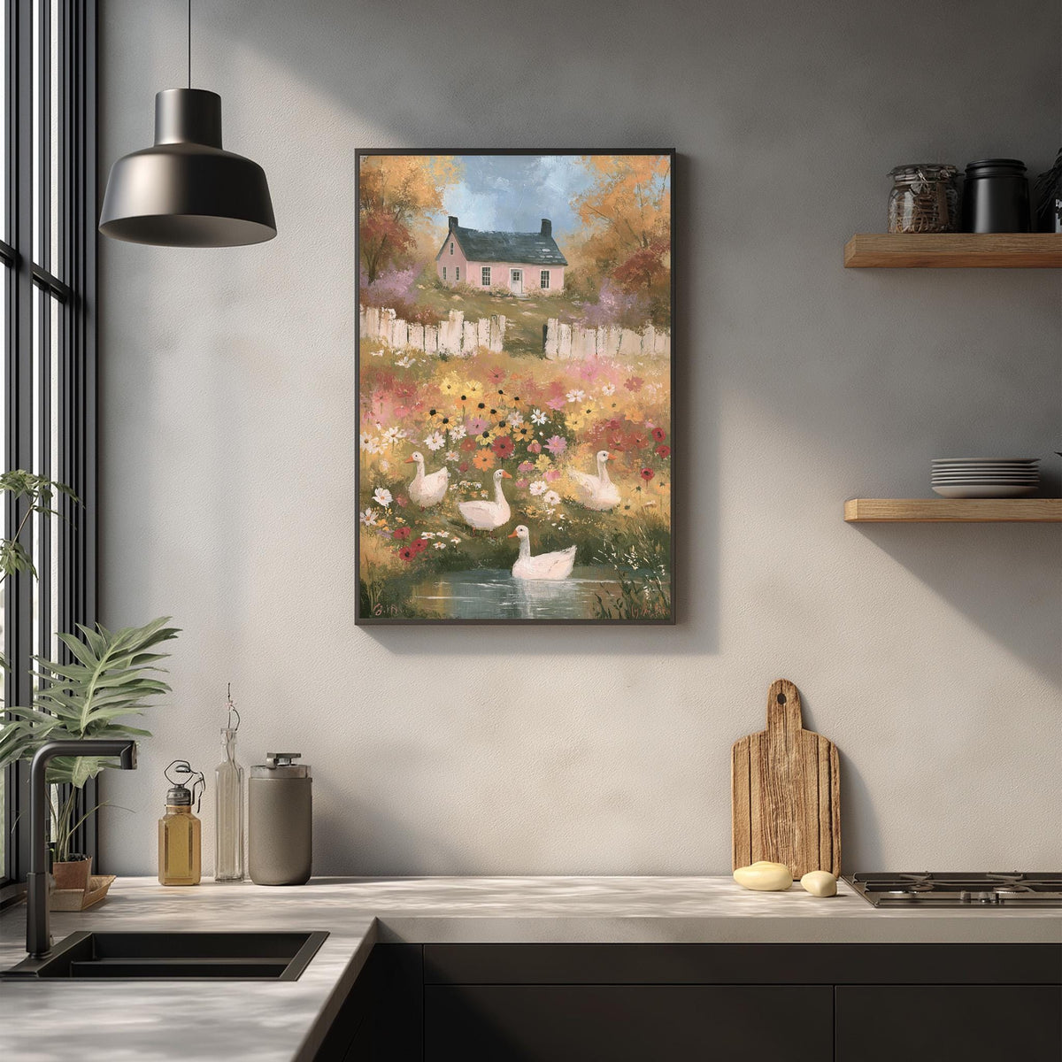 a kitchen scene with a painting of a house and ducks in a pond hanging on the wall above a wooden cutting board and other kitchen items.