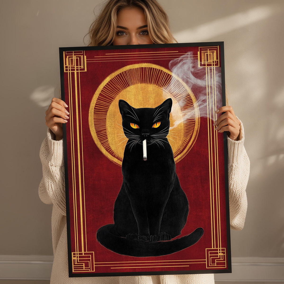 A woman holds up a framed artwork depicting a black cat with a cigarette in its mouth.