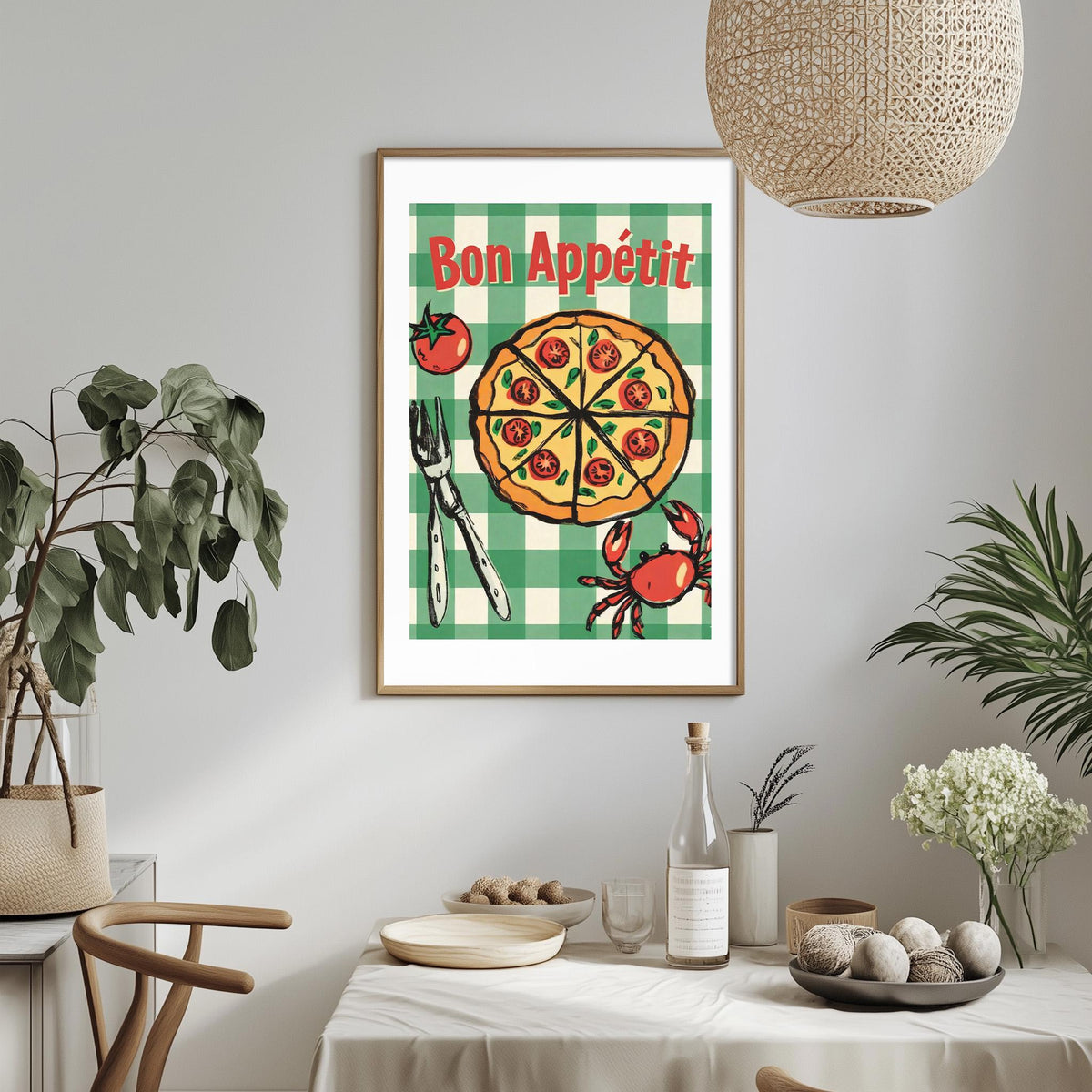 a framed poster of a pizza with various food items, such as a crab, on a green and white checkered background, hanging on a wall above a dining table with a white tablecloth.