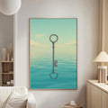 a large framed artwork depicting a key floating in a serene body of water, creating a surreal and dreamlike scene.