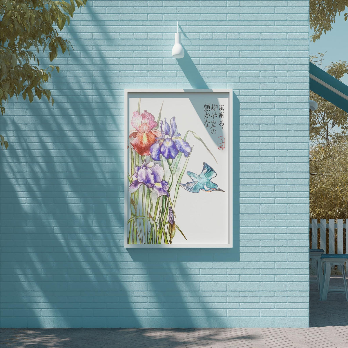 A framed painting of colorful flowers is displayed on a light blue wall, with a bird in flight depicted in the painting.