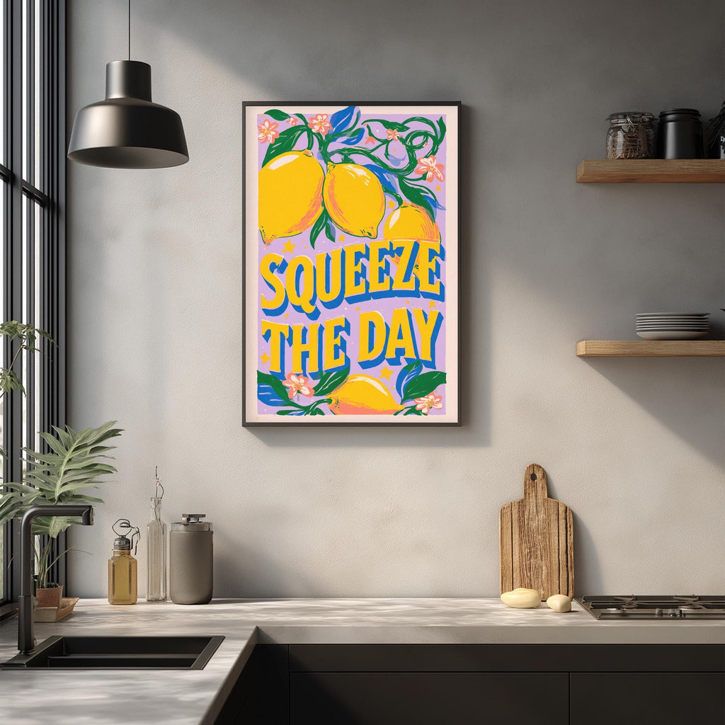 a kitchen counter with various kitchen items, such as a cutting board, a soap dispenser, and a bottle. Above the counter, there is a framed poster with the text "SQUEEZE THE DAY" in a vibrant, colorful design.