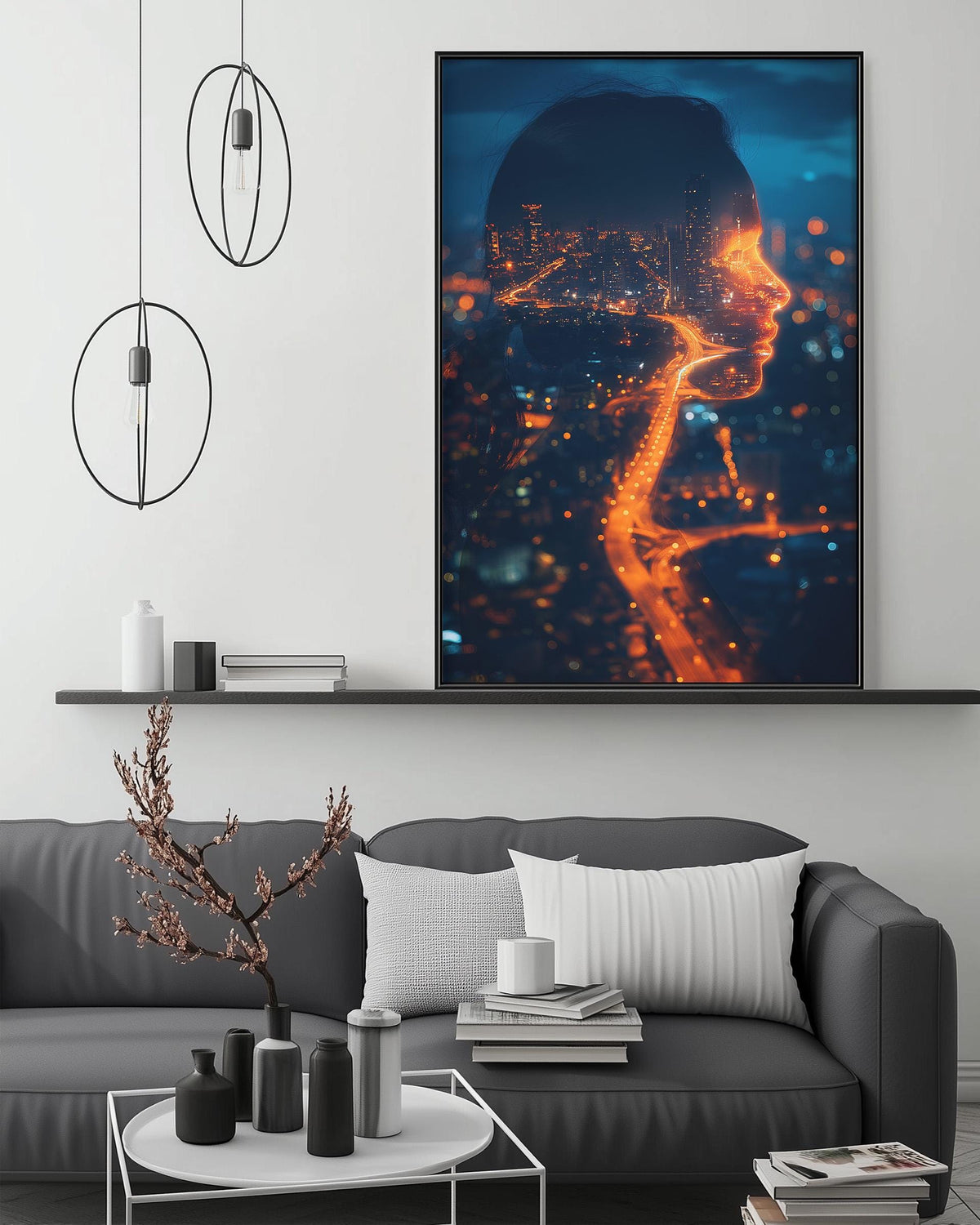 a modern living room with a gray sofa, a coffee table, and a large framed artwork depicting a city skyline at night with orange lights.