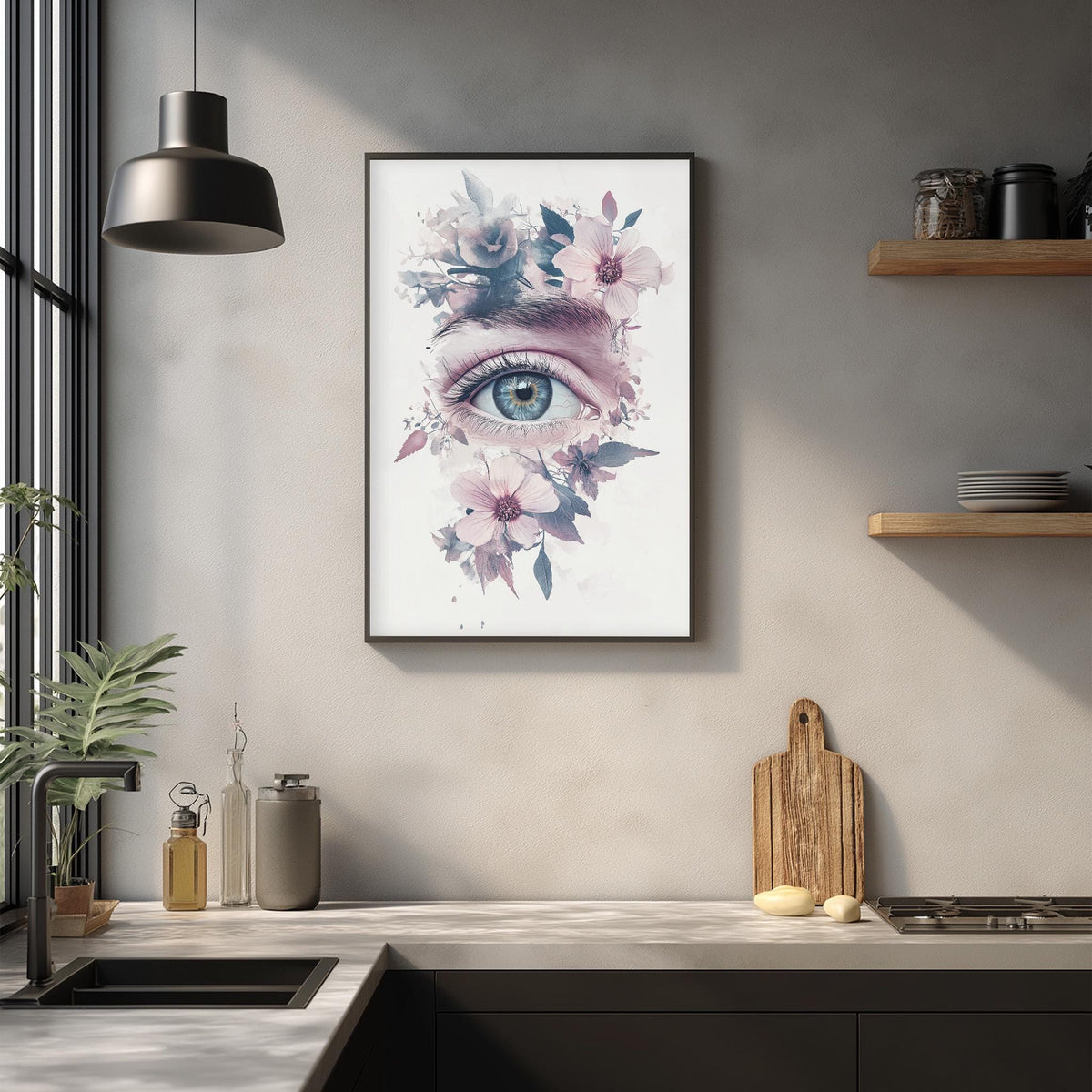 a framed artwork of a flower-filled eye on a wall, with a kitchen counter and various kitchen items in the foreground.