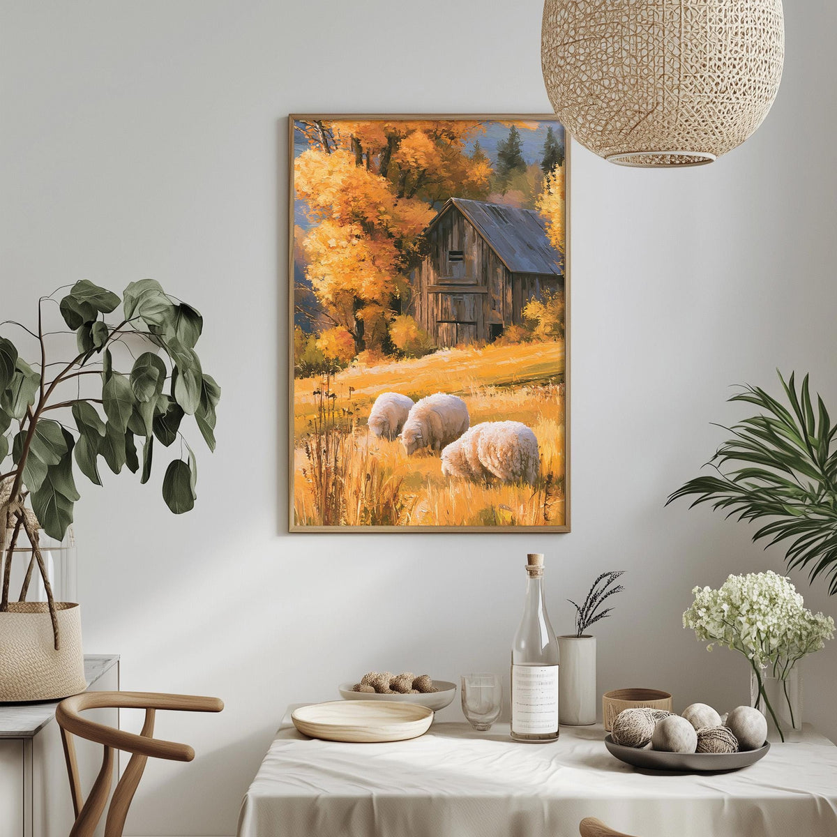 a cozy dining area with a rustic barn in the background, surrounded by vibrant autumn foliage. The dining table is set with various items, including a bottle, a bowl, and a vase, creating a warm and inviting atmosphere.