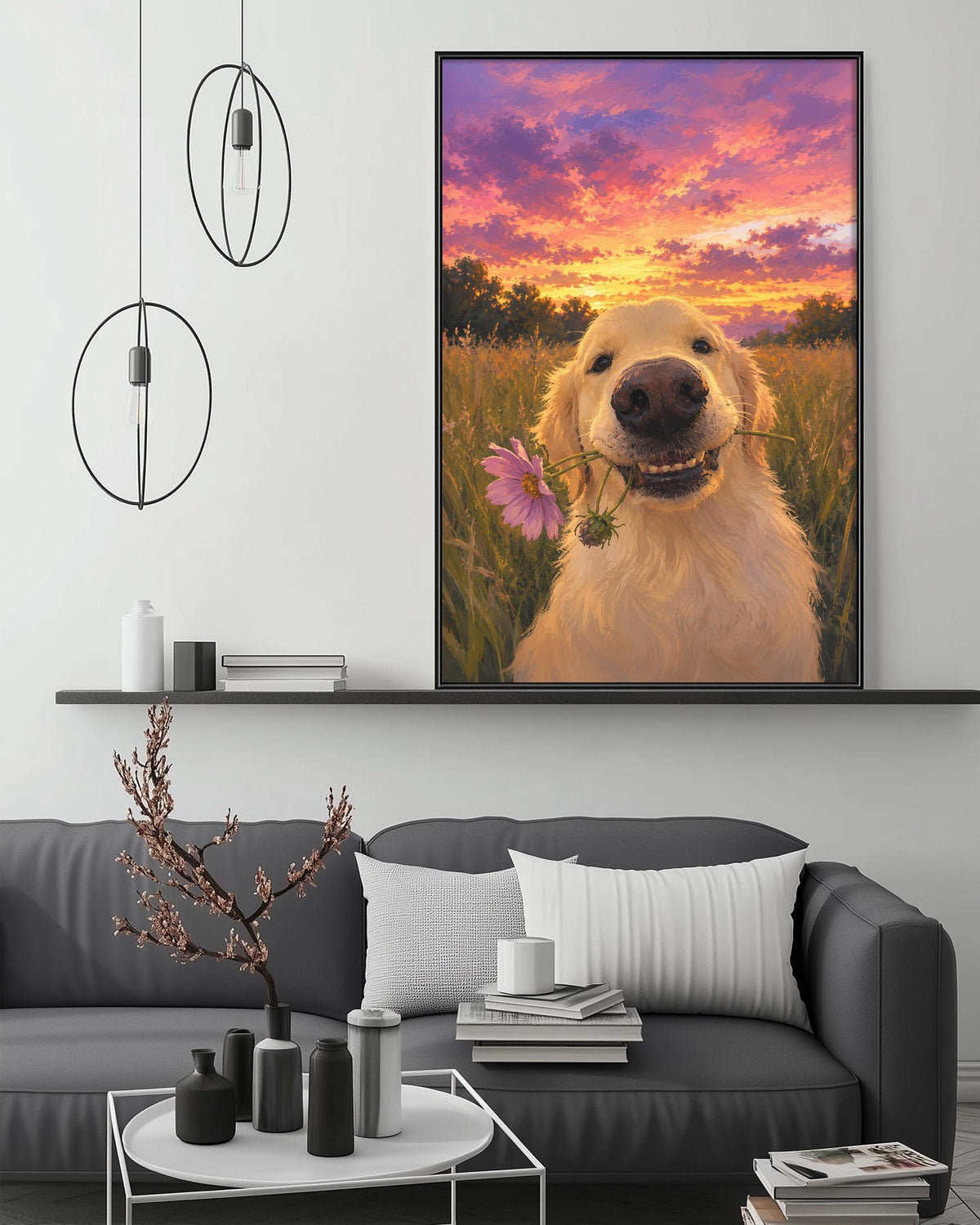 a large, vibrant painting of a golden retriever dog holding a pink flower in its mouth, set against a colorful sunset sky. The painting is hanging on a wall above a gray couch, which has a coffee table in front of it. The room also includes a shelf with various decorative items, and a potted plant on the floor.