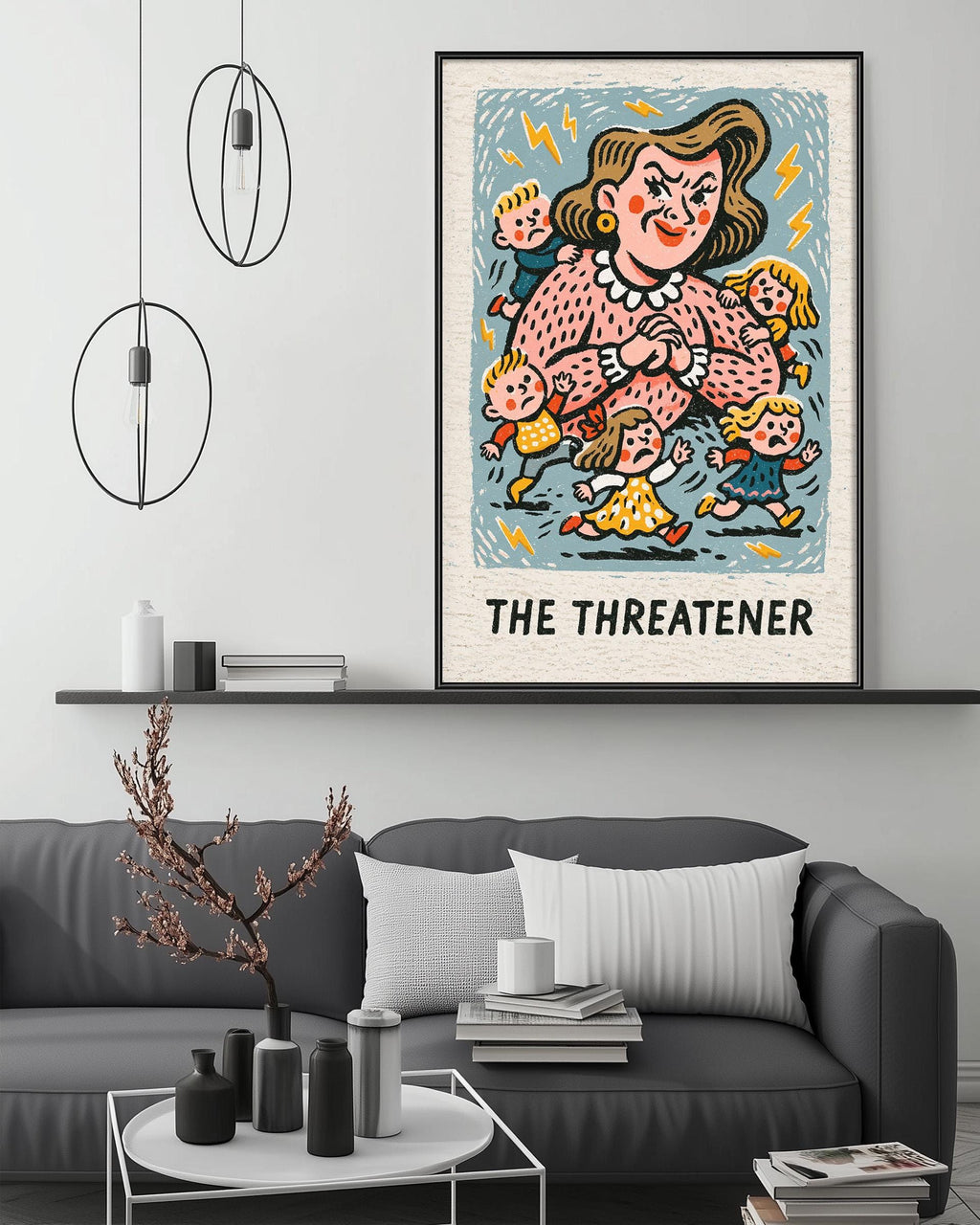 a large framed poster of a cartoon character, "The Threatener", hanging on a wall above a gray couch in a living room setting.