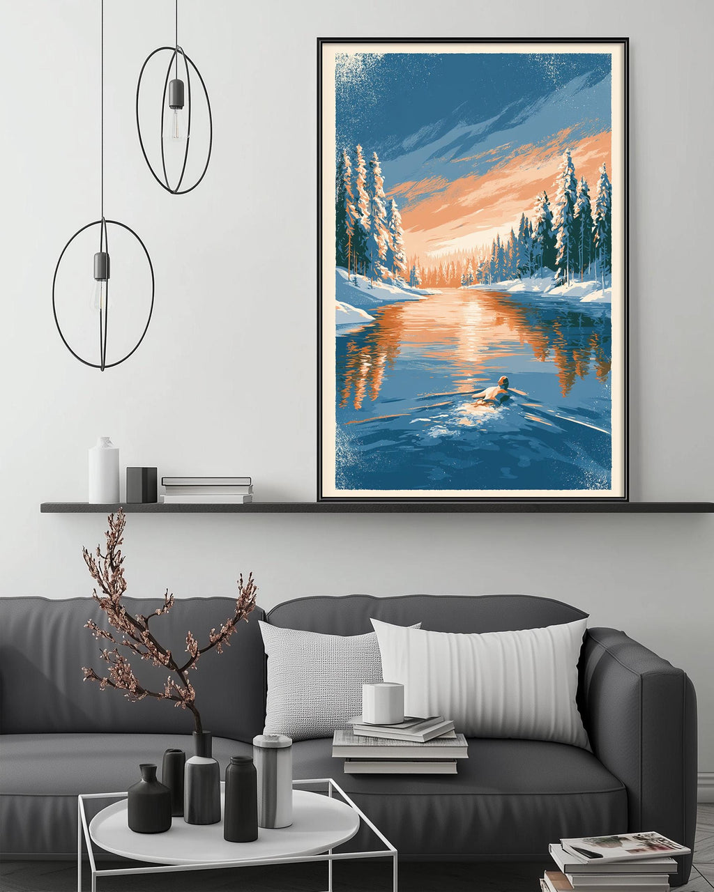 a cozy living room with a gray sofa, a coffee table, and a large framed painting of a serene winter landscape hanging on the wall above the sofa.