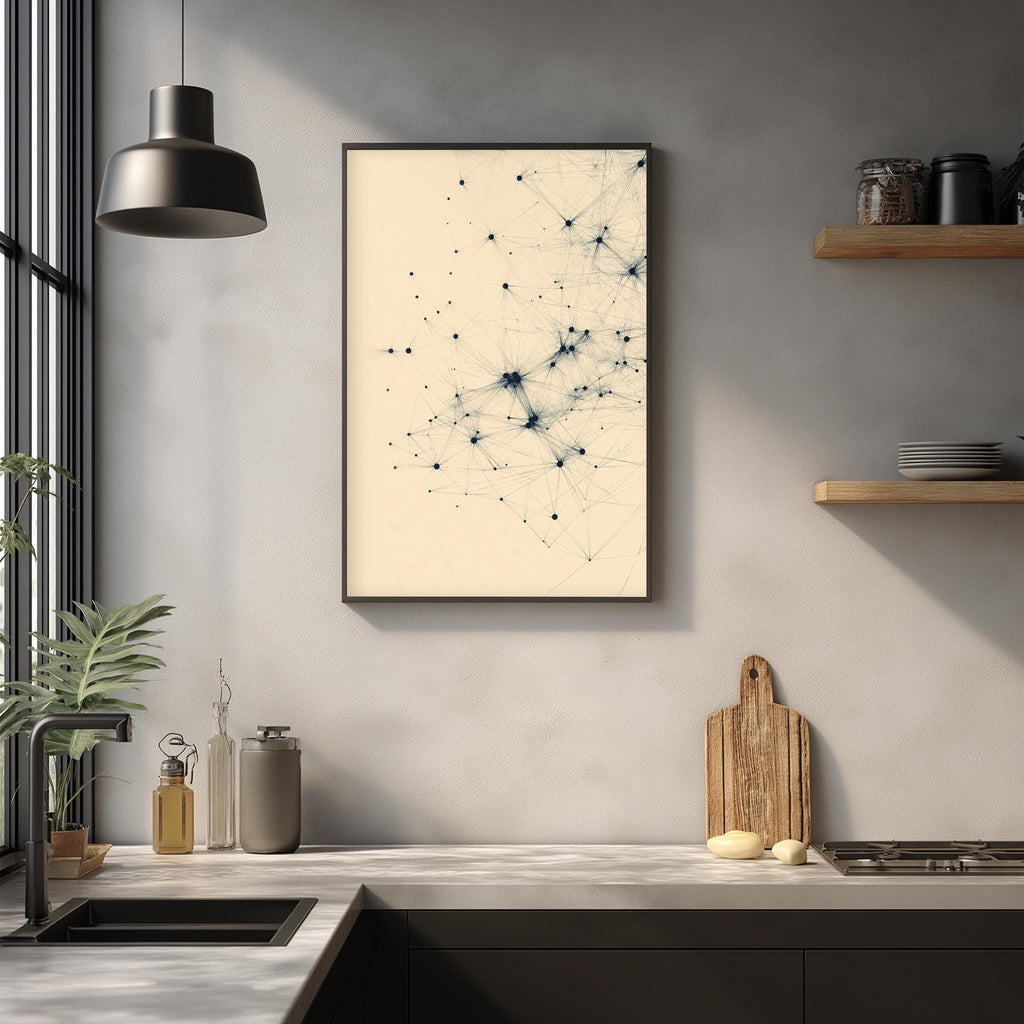 a modern kitchen with a minimalist design. The focal point is a framed artwork with a network of lines and dots on a beige background, hanging on the wall above a kitchen counter. The counter is equipped with various kitchen items, including a cutting board, a sink, and a few bottles. The overall color scheme of the kitchen is neutral, with a touch of green from the potted plant and a wooden shelf adding warmth to the space.