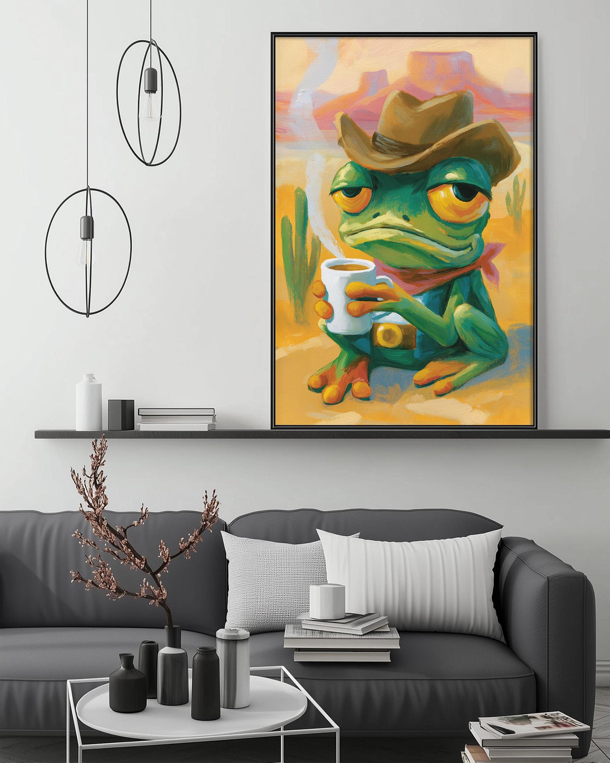 a cozy living room with a gray couch, a coffee table, and a large framed painting of a frog wearing a cowboy hat. The painting is hanging on the wall above the couch, creating a whimsical and playful atmosphere in the room.