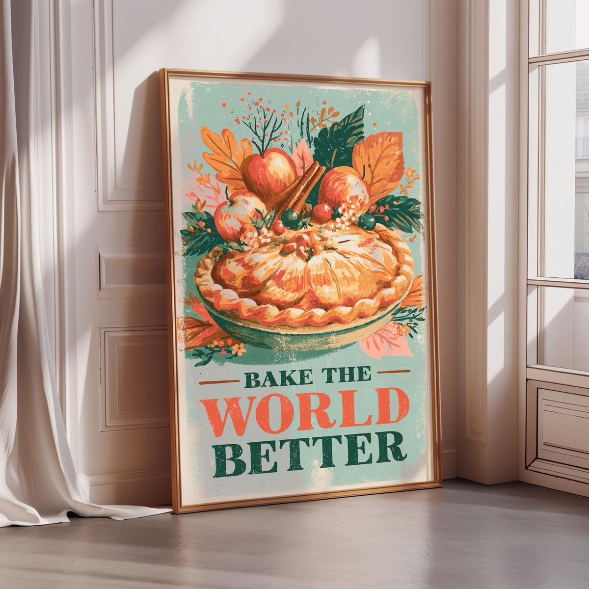 A framed poster with a vibrant illustration of a pie surrounded by autumn leaves and fruits, along with the text "Bake the World Better".