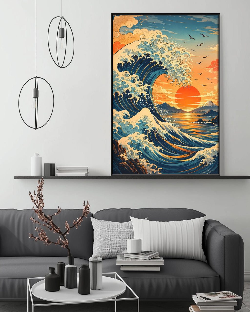 a large, colorful painting of a crashing wave with a sunset in the background, hanging on a wall above a gray couch with a coffee table in front of it.