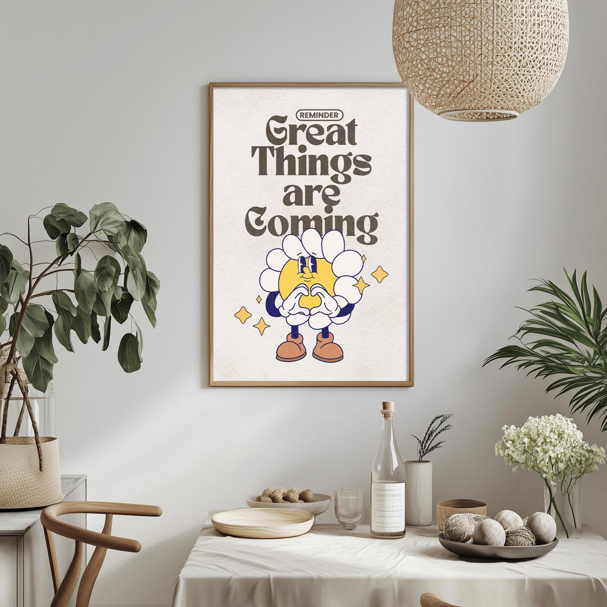 a framed poster with a cartoon character and the text "Great Things are Coming" hanging on a wall above a dining table with various items on it.