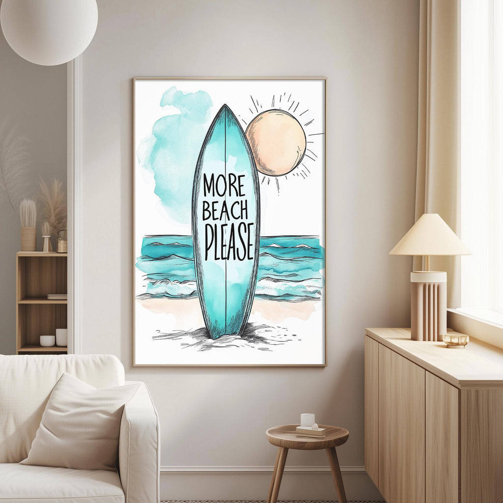 a framed poster with a surfboard and a beach scene, along with the text "MORE BEACH PLEASE" written on it.