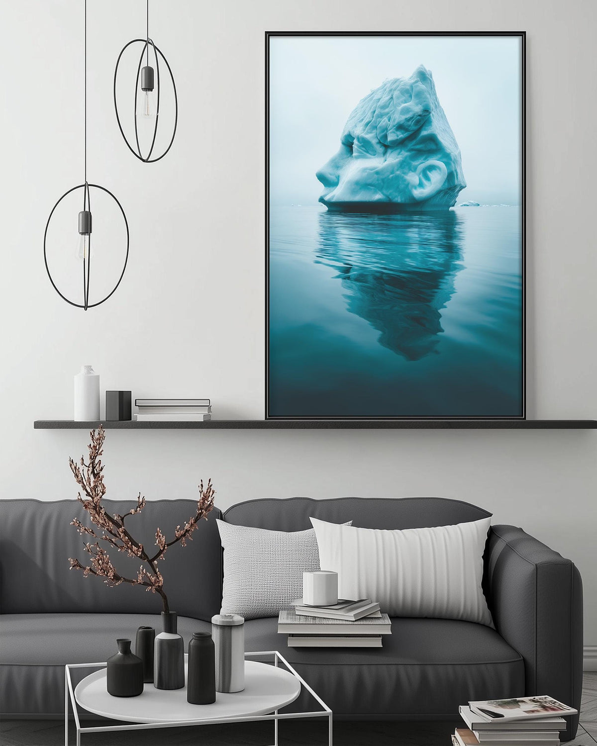 a large framed photograph of an iceberg floating in the ocean, with a minimalist and modern living room setting in the foreground.