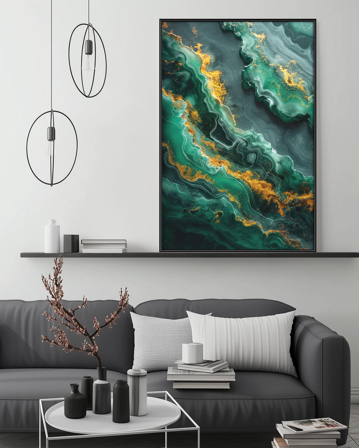 a modern living room with a gray sofa, a coffee table, and a large abstract painting hanging on the wall above the sofa.