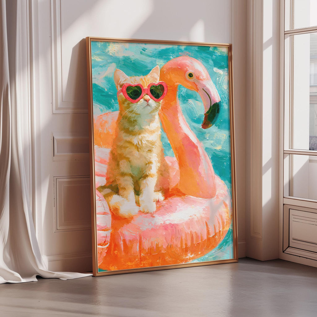 A framed painting depicting a cat wearing sunglasses and sitting on an inflatable flamingo float.
