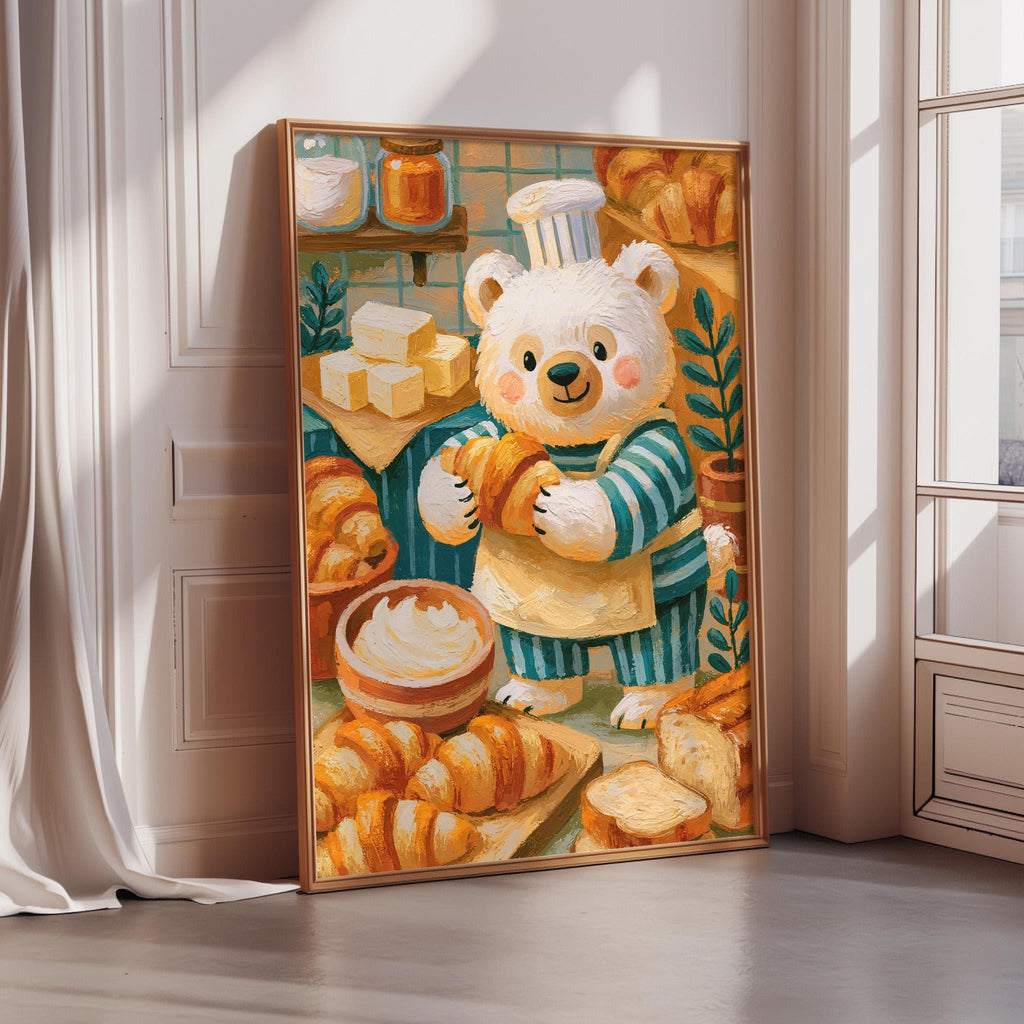 A framed illustration of a white bear wearing a chef's hat and apron, holding a loaf of bread and surrounded by various baked goods, such as croissants and cakes, in a cozy kitchen setting.